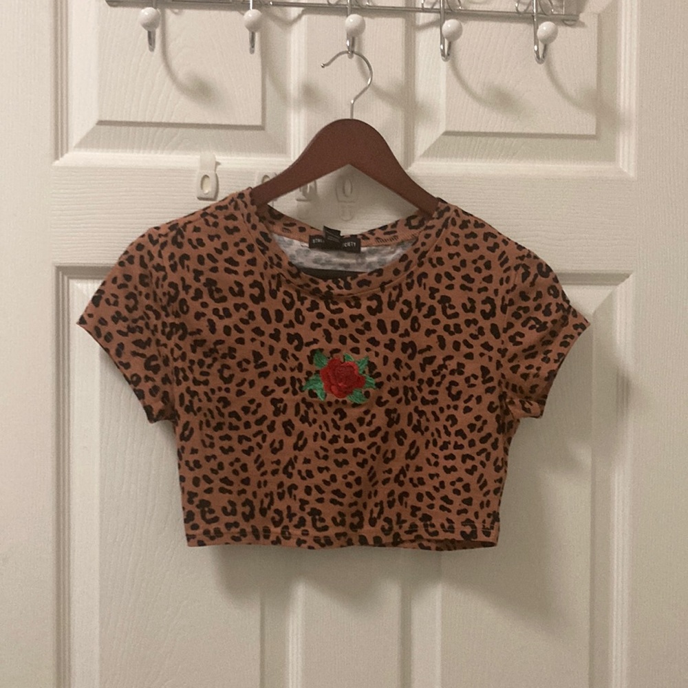 Cute crop top cheetah shirt with printed red rose. Size small.